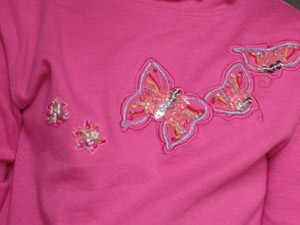 Isabelle's butterfly shirt, now with flowers
