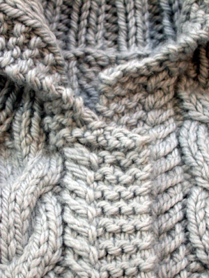 The Debbie Bliss Cabled Jacket - 8 rows too many in the left front.