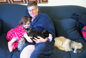 Isabelle and Anne-ma snuggled up with Poppy, Jazz and Shae this morning