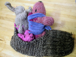 knitting toys in knitted slipper