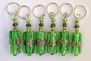 Green and pink flower stitch markers