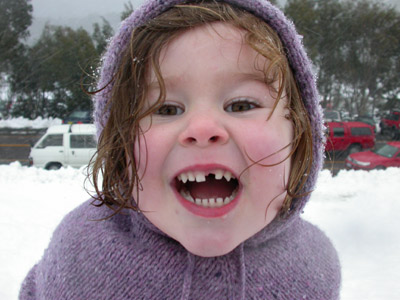 Isabelle wears her Poncho at Threadbo. The journey to Adelaide - July 2005