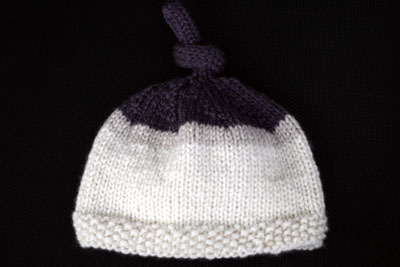 Baby Hat with Moss Stitch Band and knot top